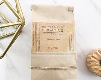 Butter Me Up Organics soap bar packaging on a white background