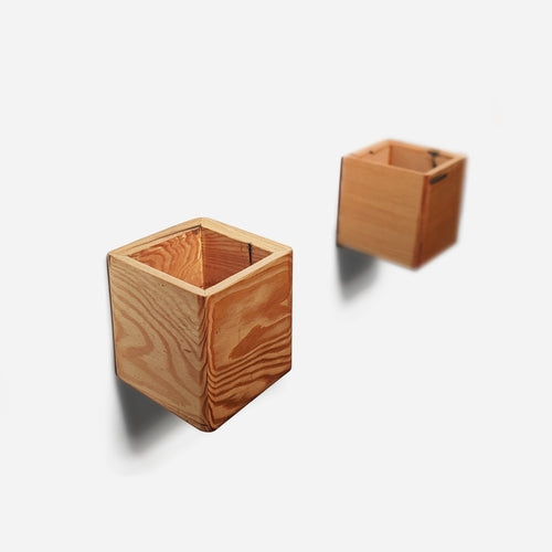 Diamond self-watering, wall-mounted planter Diamond self-watering, wall-mounted planter