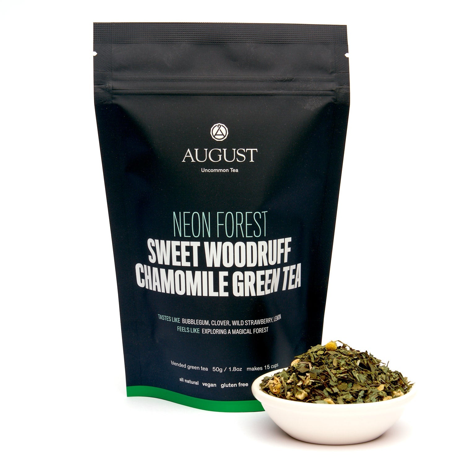 August tea package with a bowl of green tea leaves on a white background