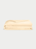 Lemonade Bamboo Duvet Cover neatly folded. Photo taken with white background. |Color: Lemonade