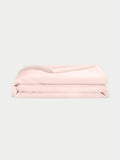 Peony Bamboo Duvet Cover neatly folded. Photo taken with white background. |Color: Peony