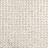 Close-up of a textured beige fabric surface