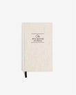 Beige journal with 'The Five Minute Journal' text on a white background