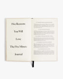 Open book with text about 'The Five Minute Journal' on a white background