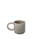 Speckled gray mug on a white background