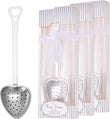 Heart-shaped metal tea infuser in packaging with 'Tea Time' label