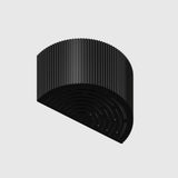 Black 3D-printed object on a light gray background