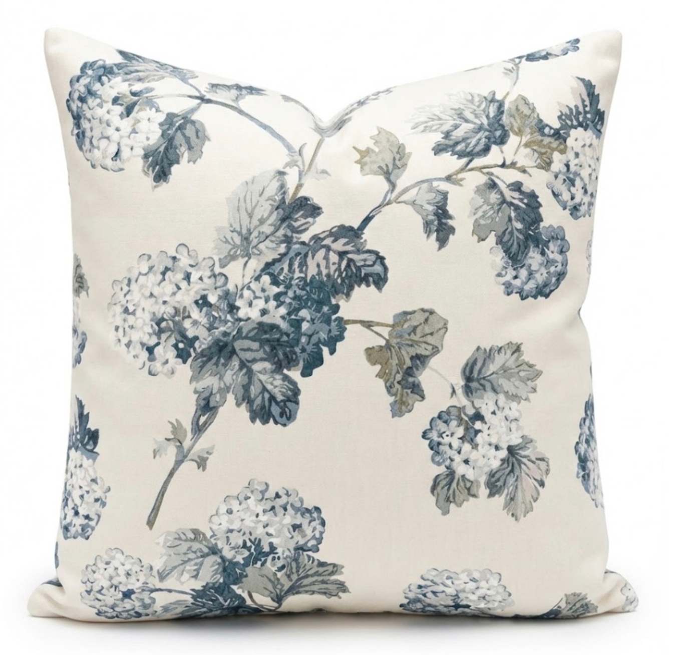 Decorative pillow with blue floral pattern on a white background
