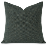 Textured dark green pillow on a white background