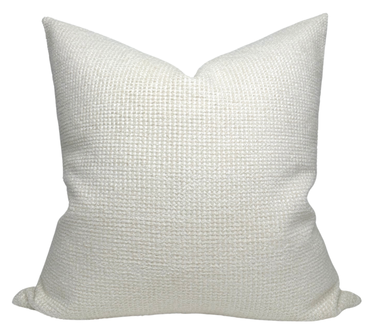 Textured white pillow on a white background