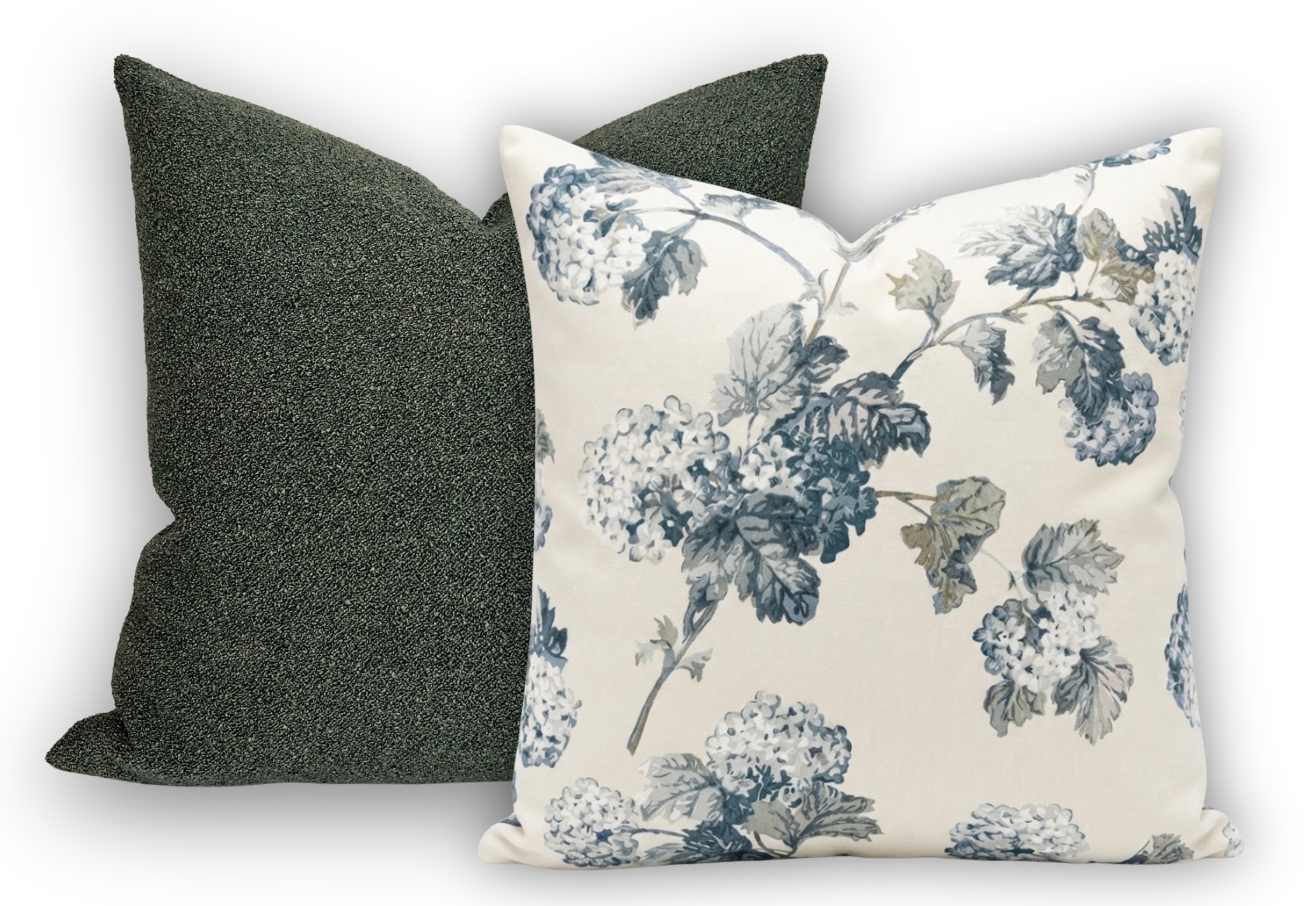 Floral-patterned pillow and a plain dark gray pillow on a light background