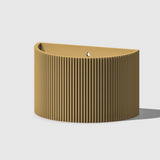 Brown ribbed cylindrical object on a light gray background