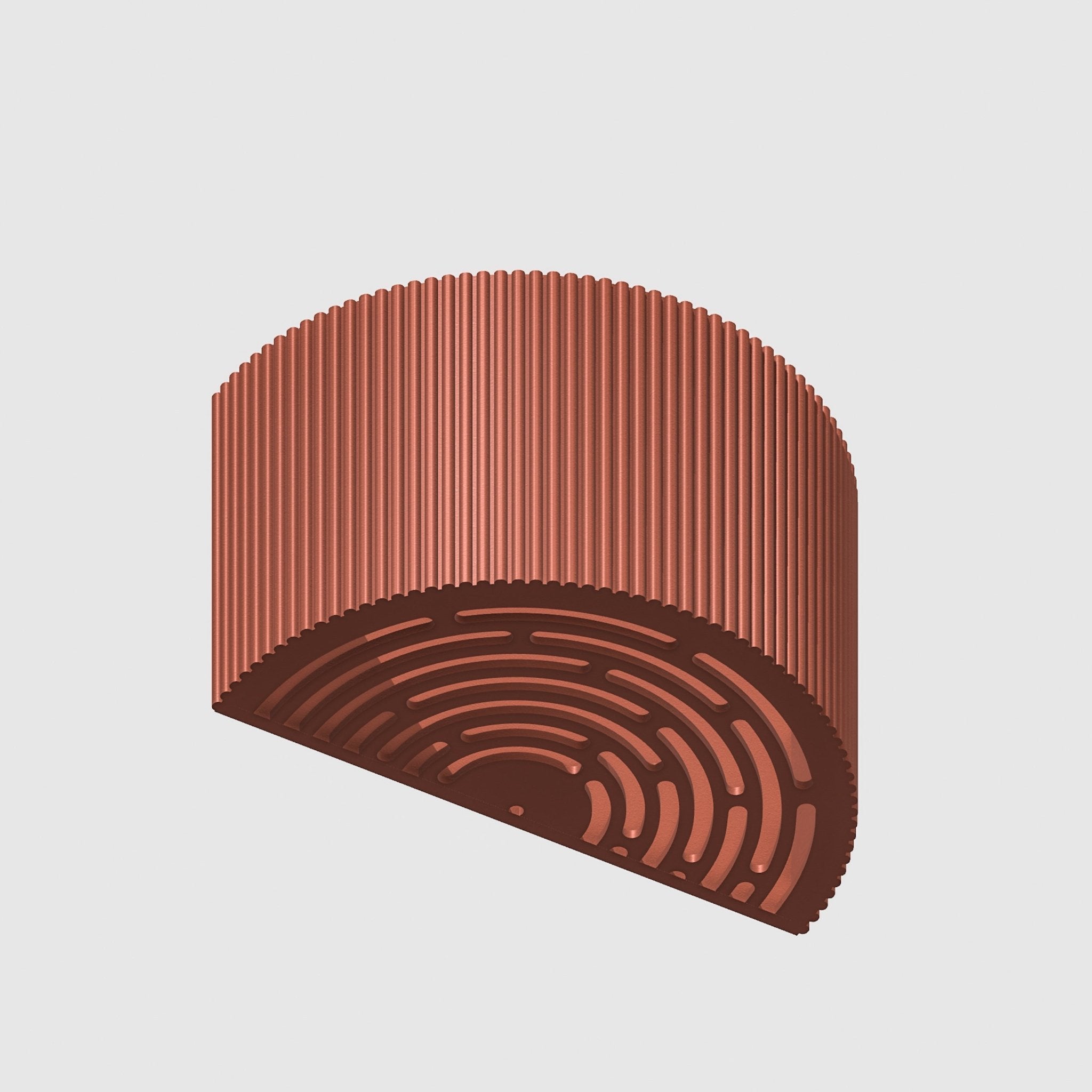 Brown, ribbed cylindrical object on a light gray background
